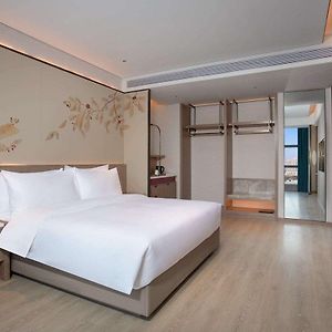 Hotel Ramada By Wyndham Huangshi Huangshigang Exterior photo