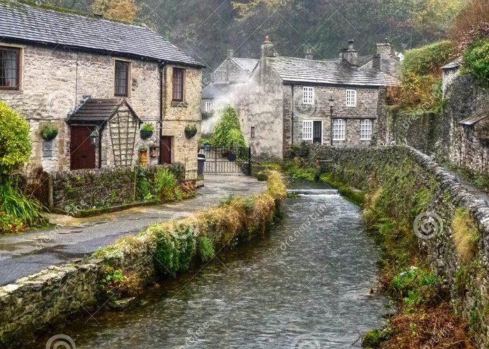 Peak Cavern Stream Runs between the Pretty Village Cottages of Castleton ... photo