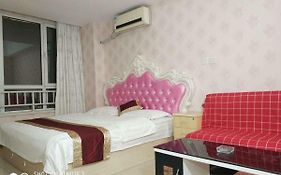 Wanda Gold Dragon Holiday Apartment Qingdao Exterior photo